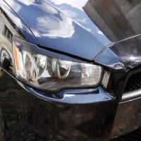 Стекло на фары Lancer X