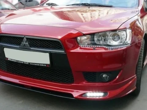 Классический тюнинг обвеса и накладки Lancer X
