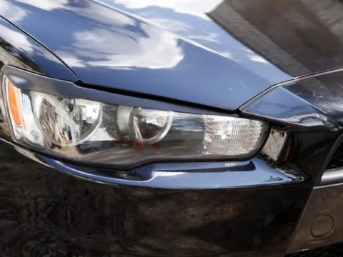 Стекло на фары Lancer X