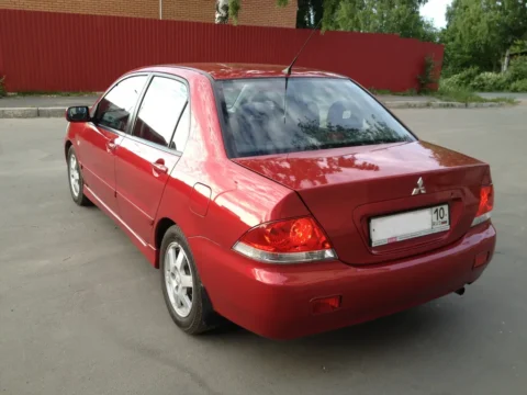 Задний бампер Mitsubishi Lancer 9