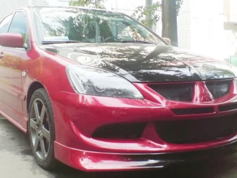 Передний бампер на Mitsubishi Lancer 9